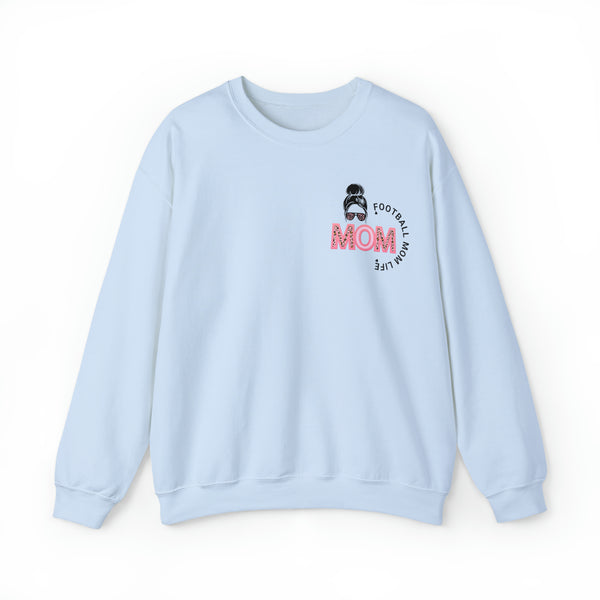 Football mom life with mom text in pink color on blue oversized beige sweatshirt - my comfy clothing