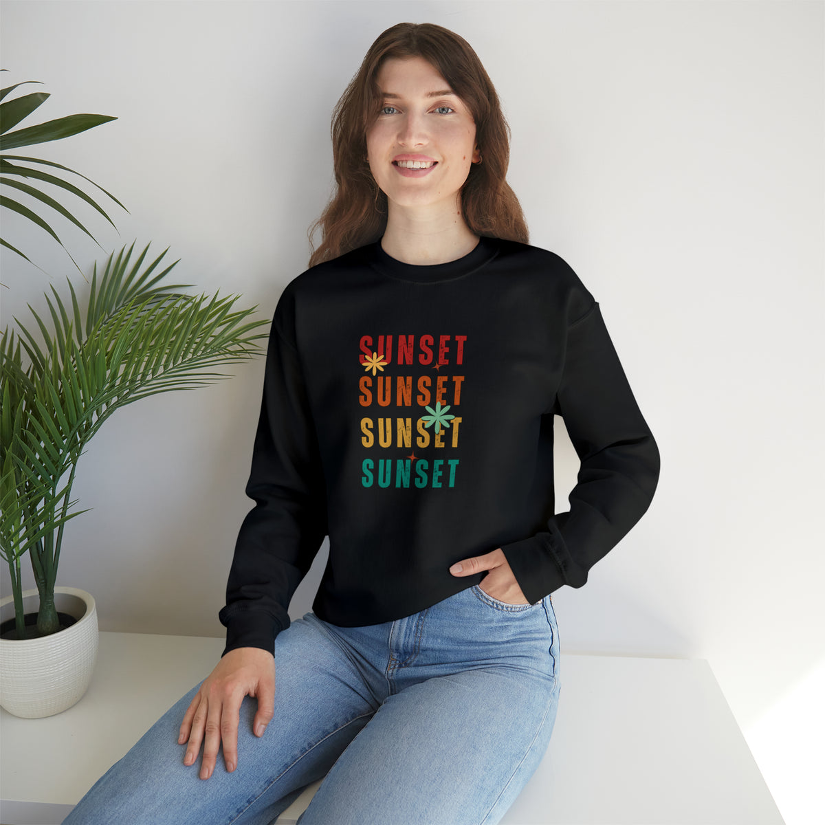 Black color sweatshirt with sunset text in red orange yellow and green colors