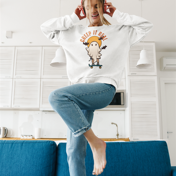 white crewneck sweat shirt with text creep it real and ghost on skateboard - my comfy clothing